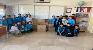 Ulaş'ta öğrenciler ihtiyaç sahibi ailelere gıda yardımında bulundu