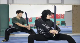 İlk dünya şampiyonasında 3 madalya kazanan milli wushucu, yeni başarılara odaklandı