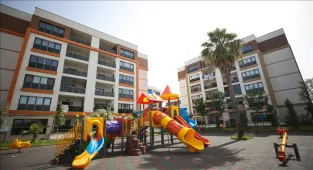 Mersin'de Yüzyılın Konut Projesi kapsamında yapılacak konutların kurası çekildi