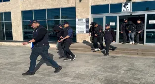 Uşak merkezli yasa dışı bahis ve dolandırıcılık operasyonunda yakalanan 15 kişiden 12'si tutuklandı