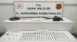 Uşak'ta bir evde 161 sikke ele geçirildi